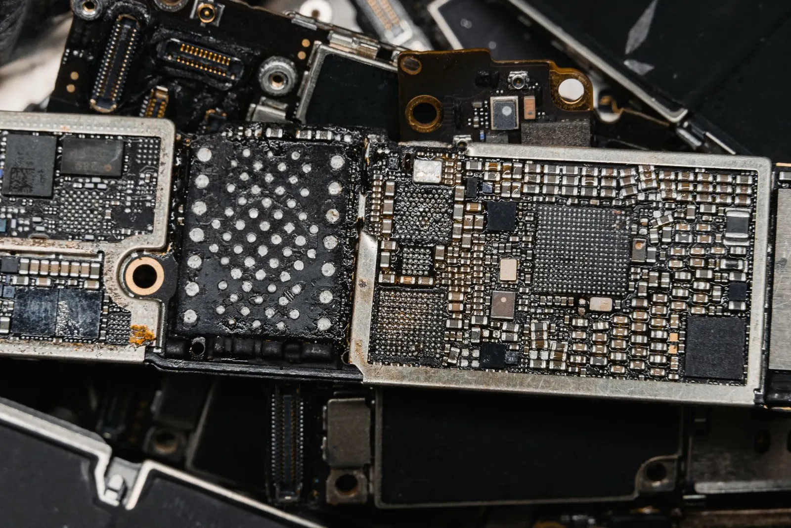 Close-up of ICs on a phone motherboard