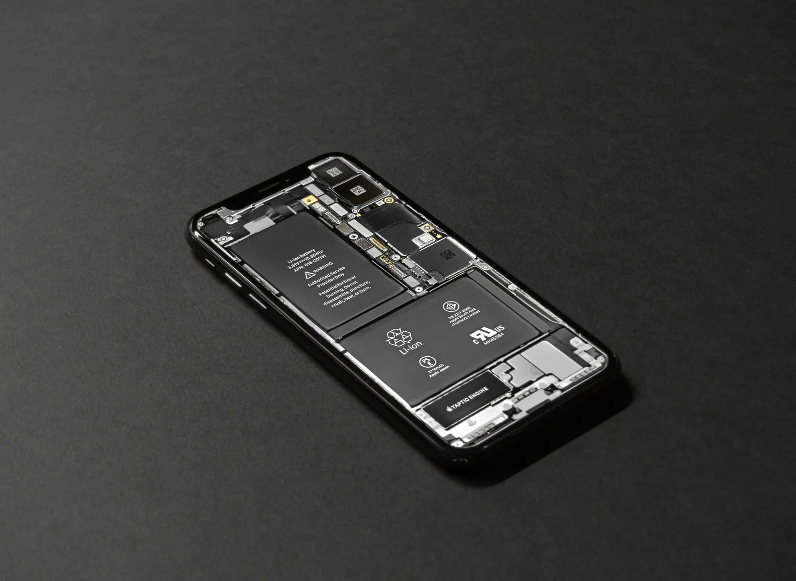 Inside of a smartphone showing battery and board